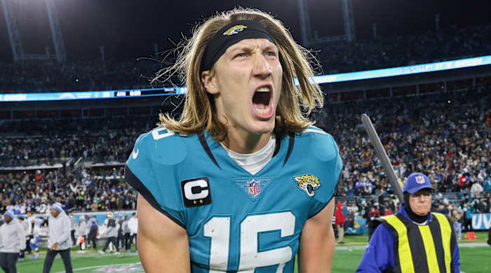 Jaguars quarterback Trevor Lawrence celebrates after beating the Los Angeles Chargers in the wild-card round